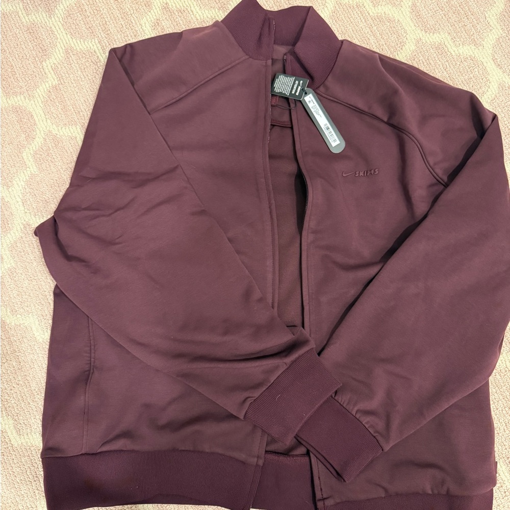 Nike Skims Burgundy Track Jacket